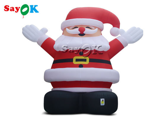 8 मीटर आउटडोर क्रिसमस Inflatable सांता क्लॉस एक लाल टोपी पहने हुए