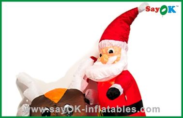 प्यारा क्रिसमस सांता पिता Inflatable क्रिसमस सजावट एक काले भालू राइडिंग